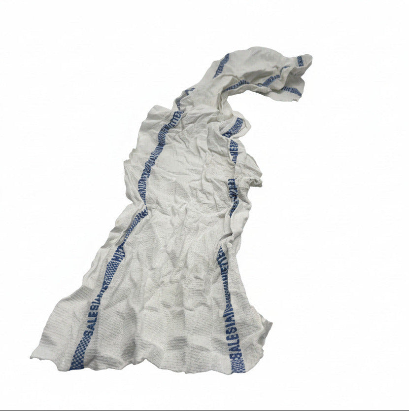 Weiße Industrieputzlappen aus Handtuchrollen-Abschnitten – saugstarke B2B-Ware im 10 kg Würfel.